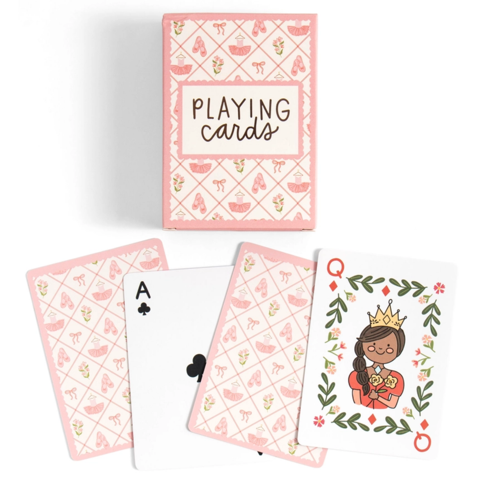 A boxed deck of playing cards with several cards fanned out below. The box and card backs have a pink patterned design with small illustrations, and one visible card shows a crowned queen illustration on a white background.