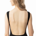 A woman shown from the back wearing a black sleeveless leotard with a very open back, against a plain white studio background.