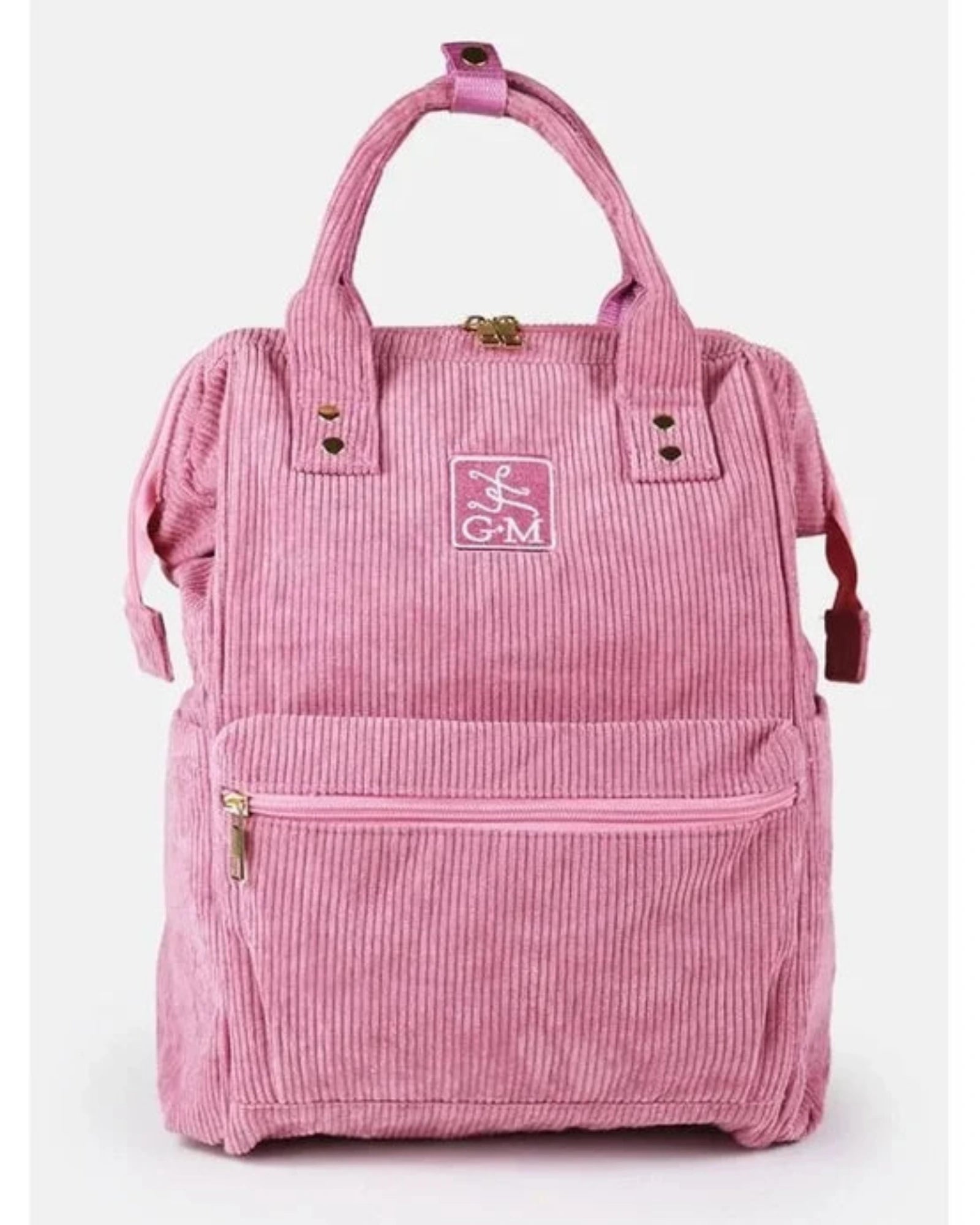 A pink corduroy backpack with dual top handles, a front zippered pocket, and a central embroidered logo patch reading 'GM' with a running figure, shown against a plain light background.