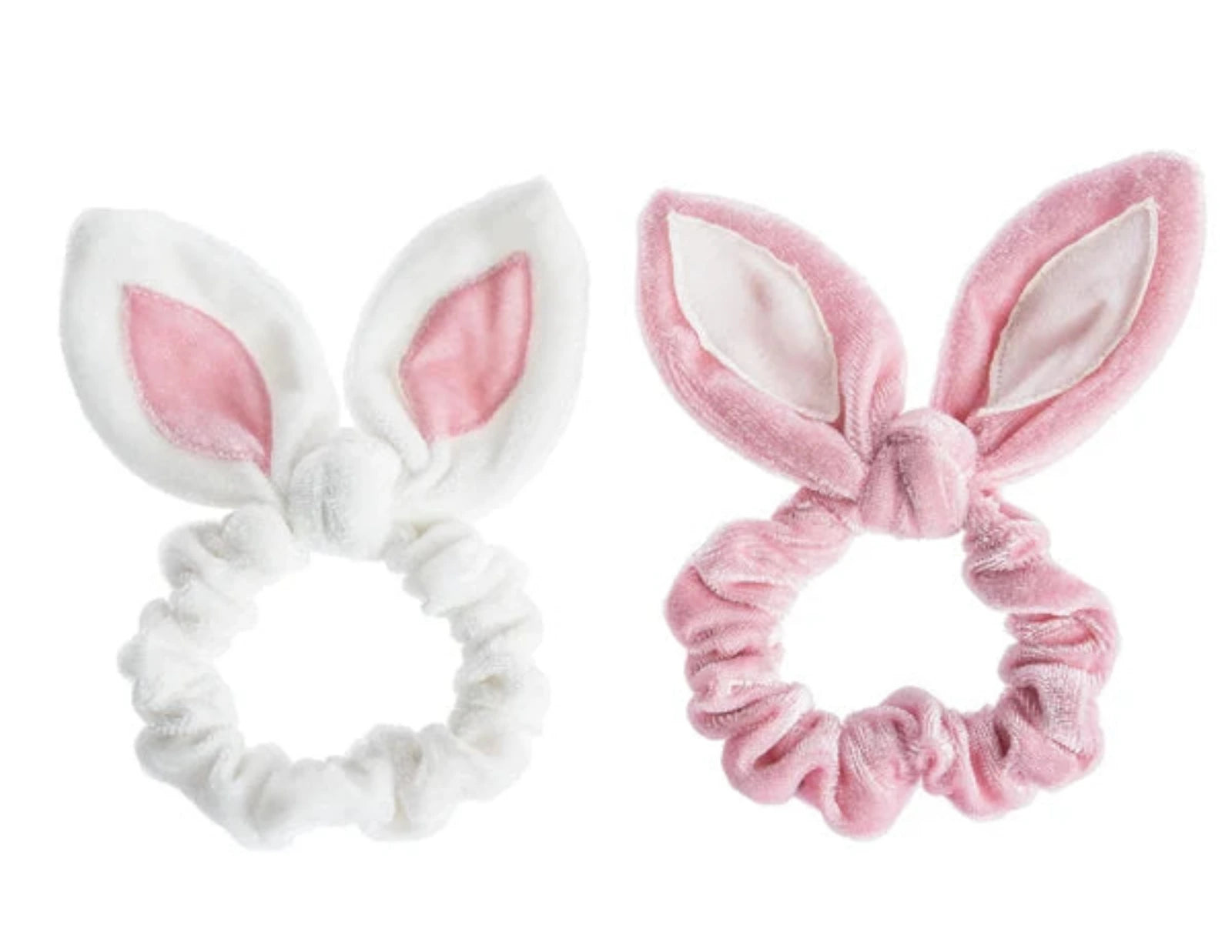 Two plush bunny-ear scrunchies on a white background, one white with a pink inner ear and one pink with a white inner ear.