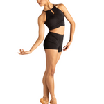 Dancer in a black dance top and shorts on a white background