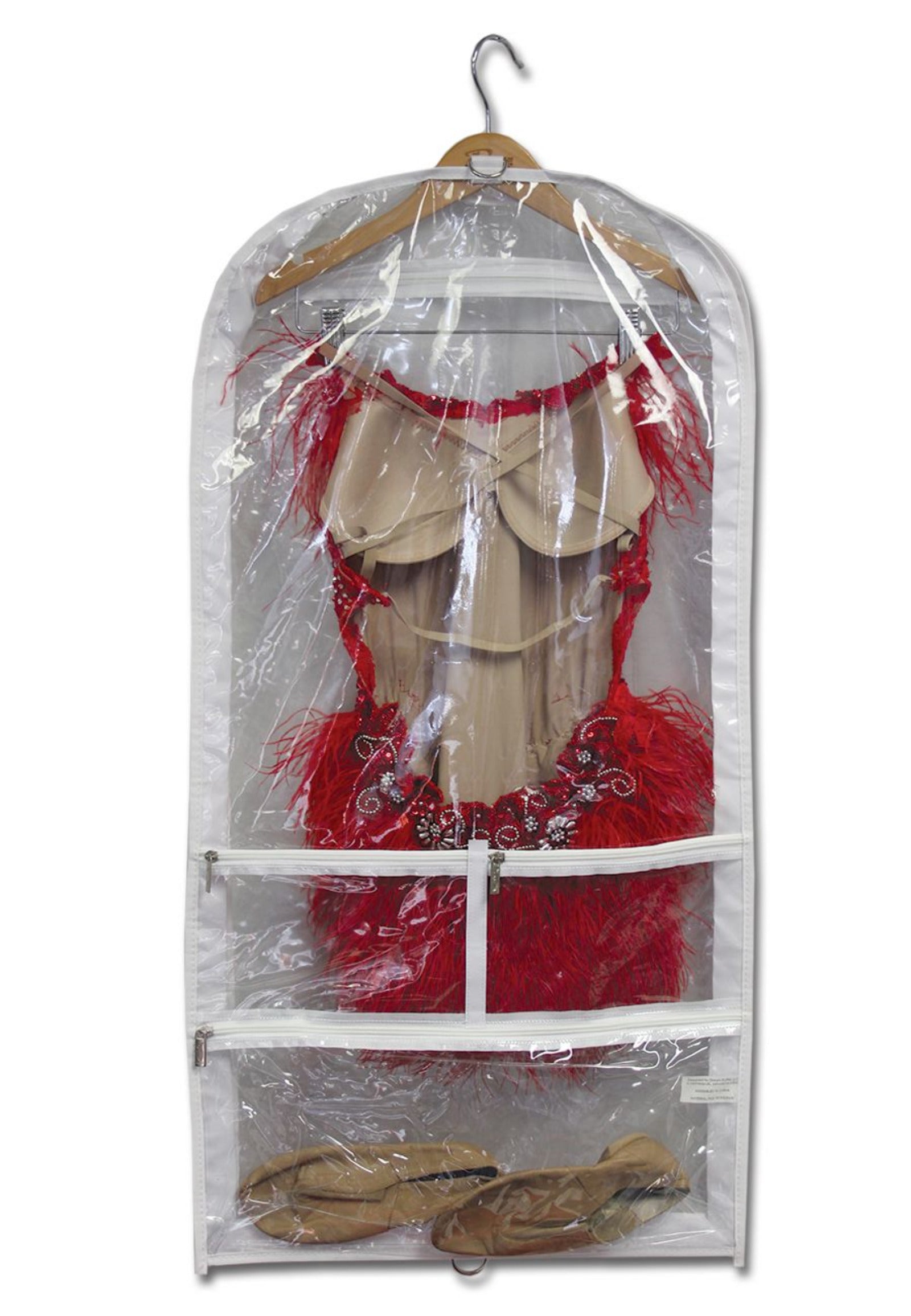 Red dress with beige shoes inside a clear plastic garment bag on a hanger.