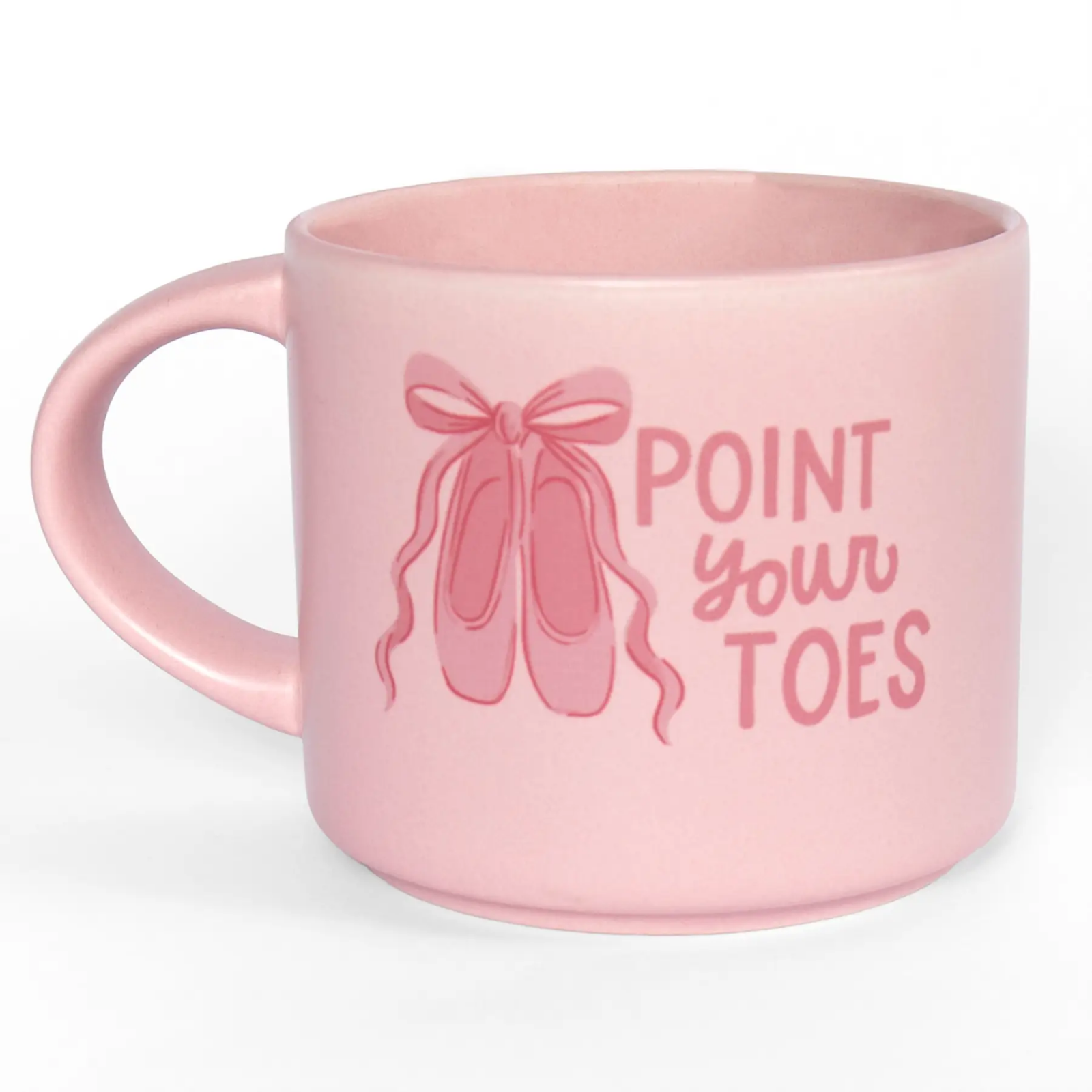 A light pink ceramic mug with a matching pink handle, featuring a graphic of ballet slippers and the text 'POINT YOUR TOES' in pink lettering.