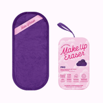 Purple makeup eraser and pink packaging on a white background