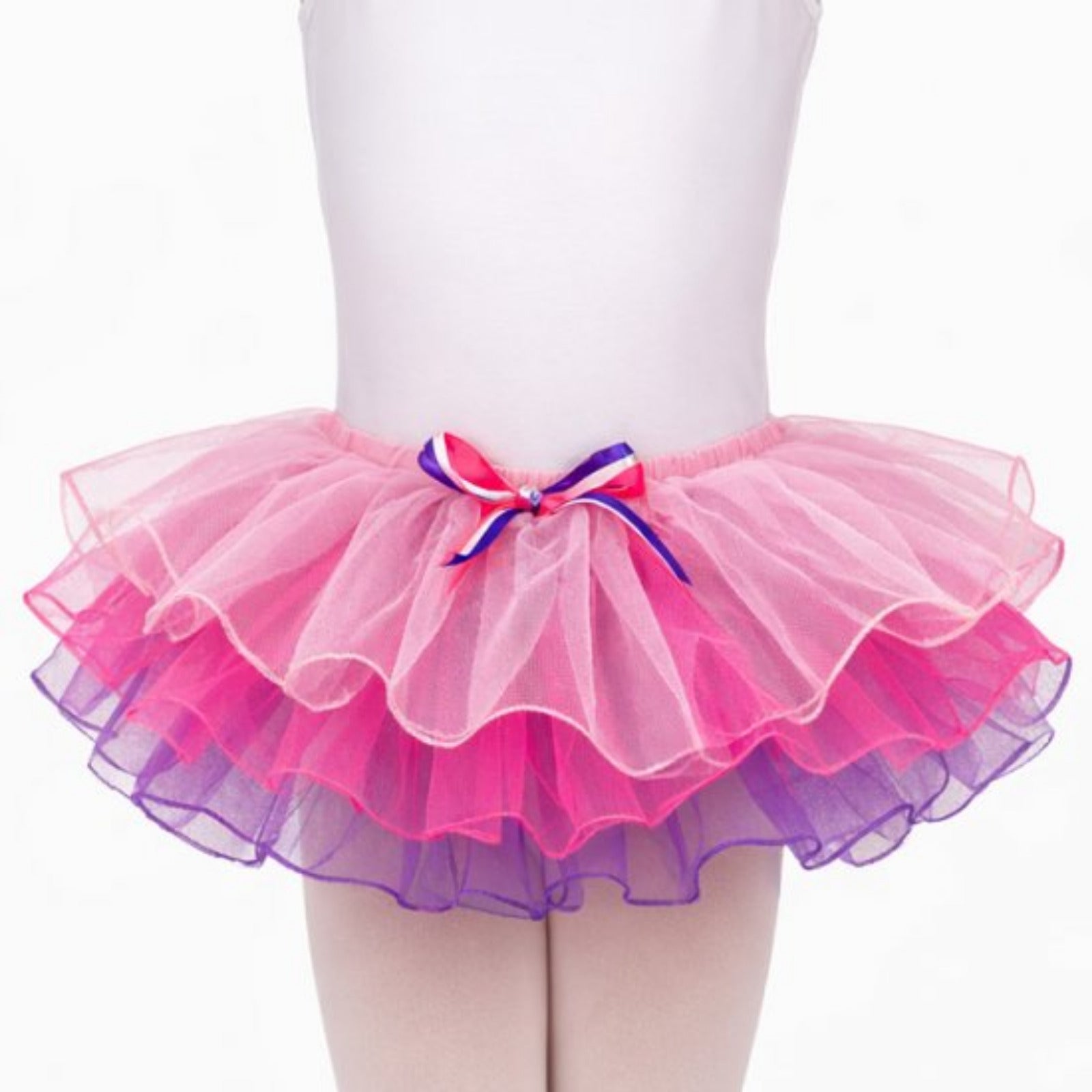Pink and purple tutu with a bow on a white background