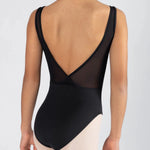 Black leotard with sheer back panel worn by a person on a light gray background