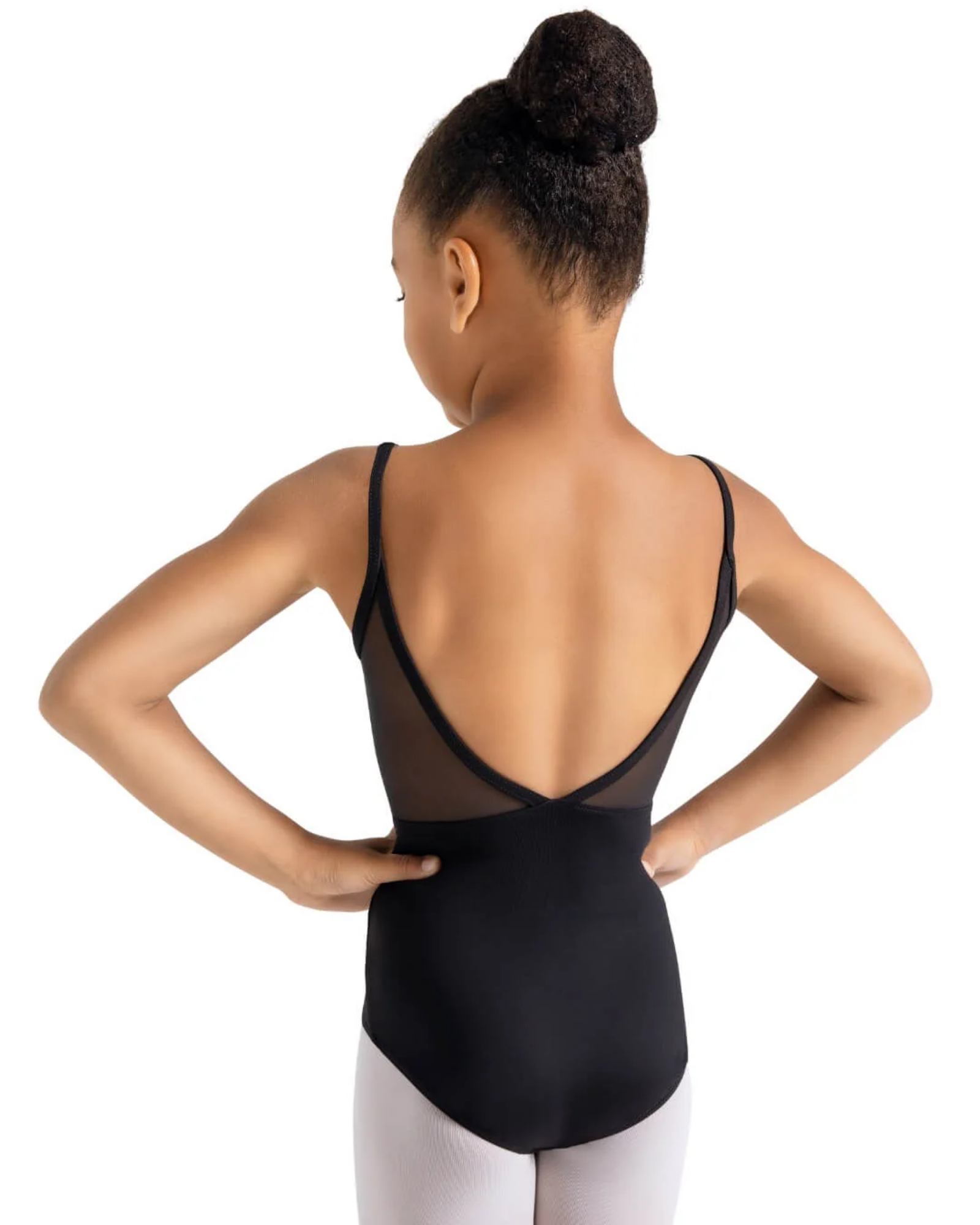 Person wearing a black leotard with sheer back panels on a white background