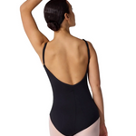 Woman wearing a black leotard on a white background