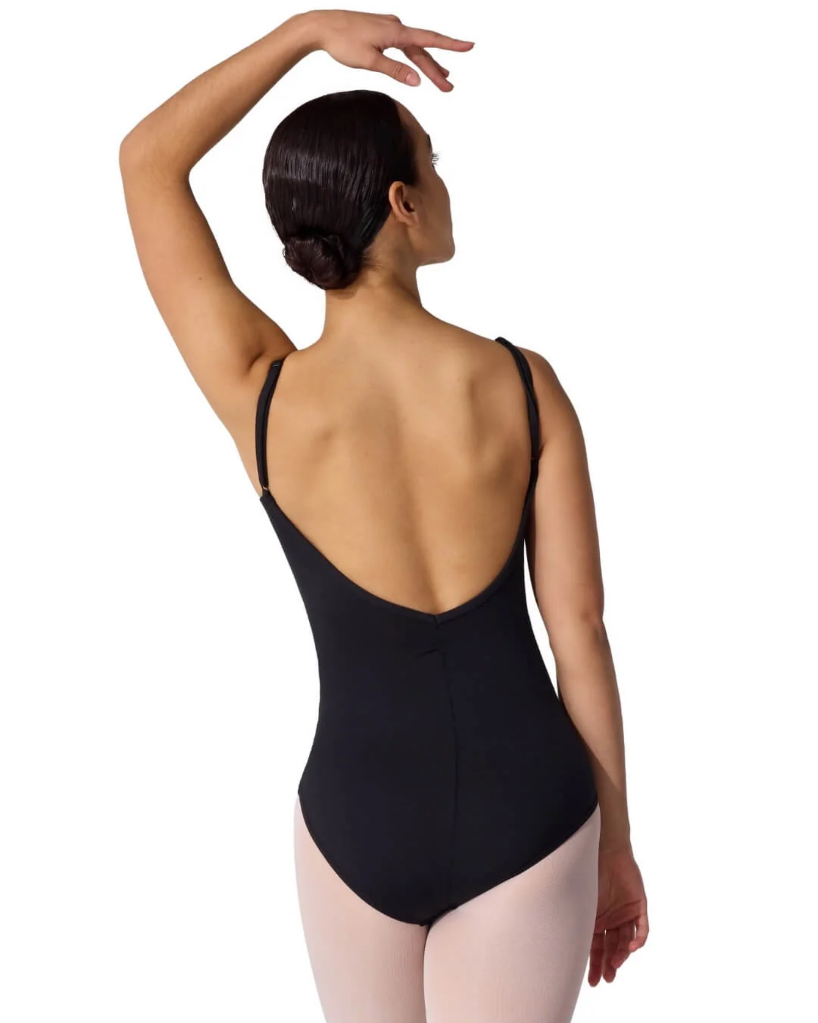 Woman wearing a black leotard on a white background