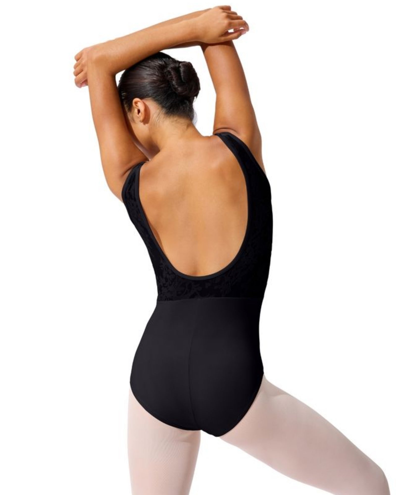 Person wearing a black leotard on a white background