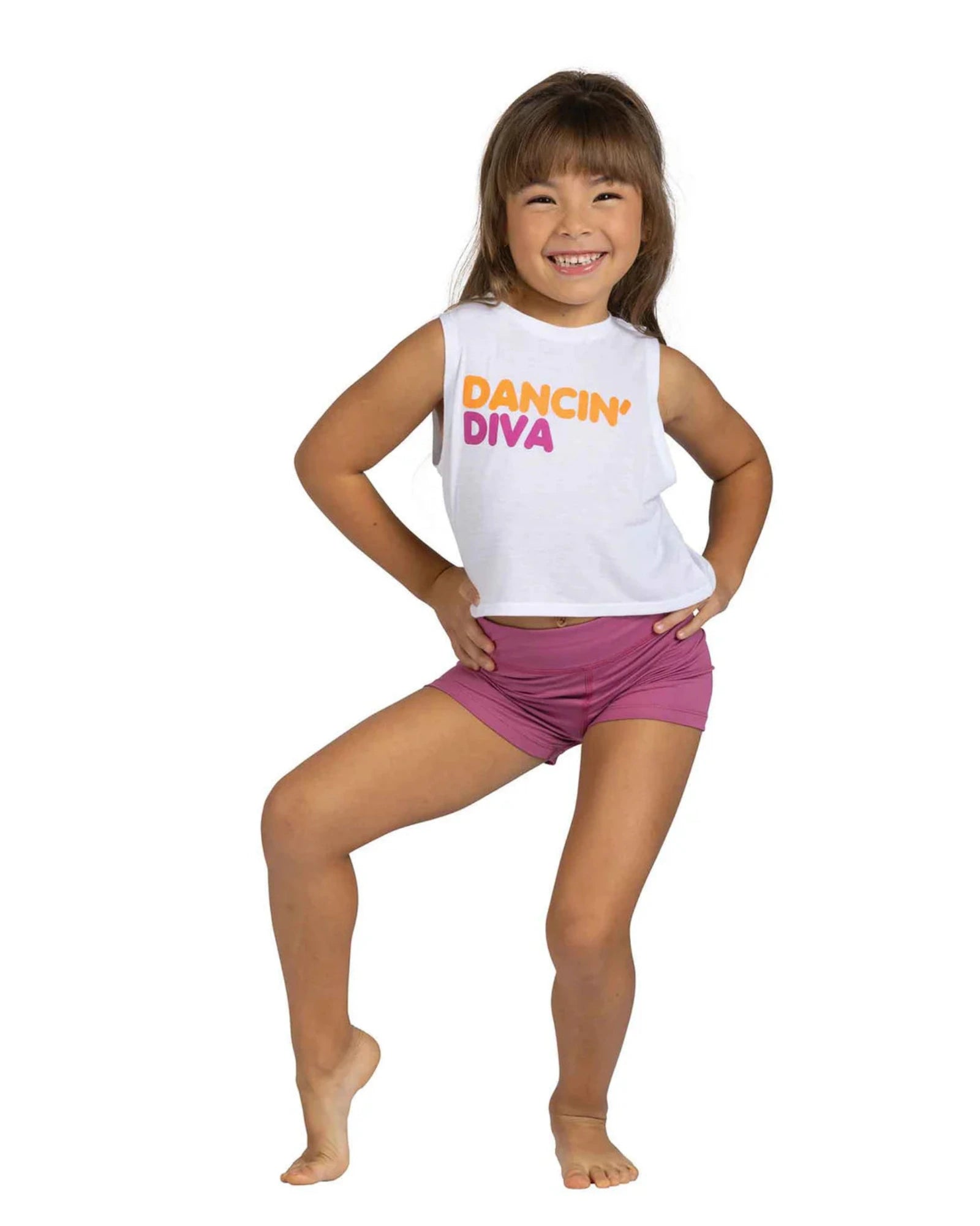 Child wearing a 'Dancin' Diva' tank top and pink shorts on a white background