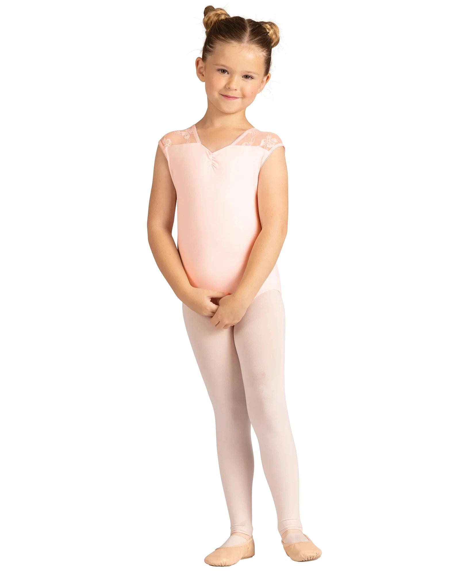 Young girl in a pink ballet outfit on a white background