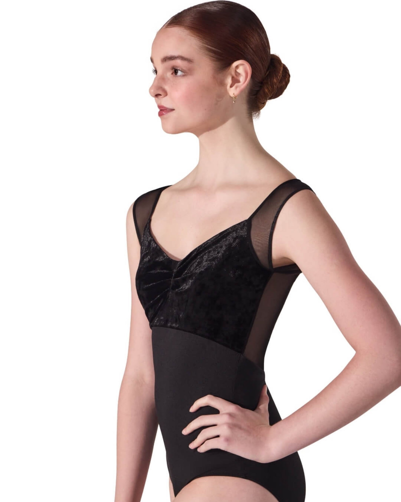 Black leotard with mesh details worn by a model on a white background