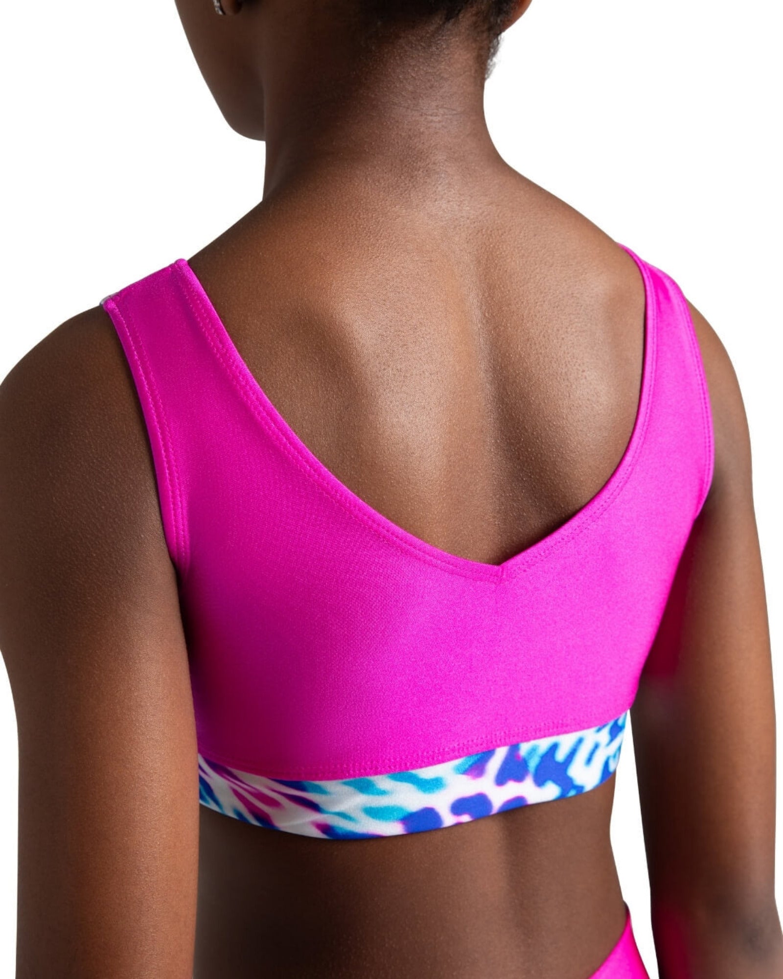 Pink dance bra top with a colorful band on a white background
