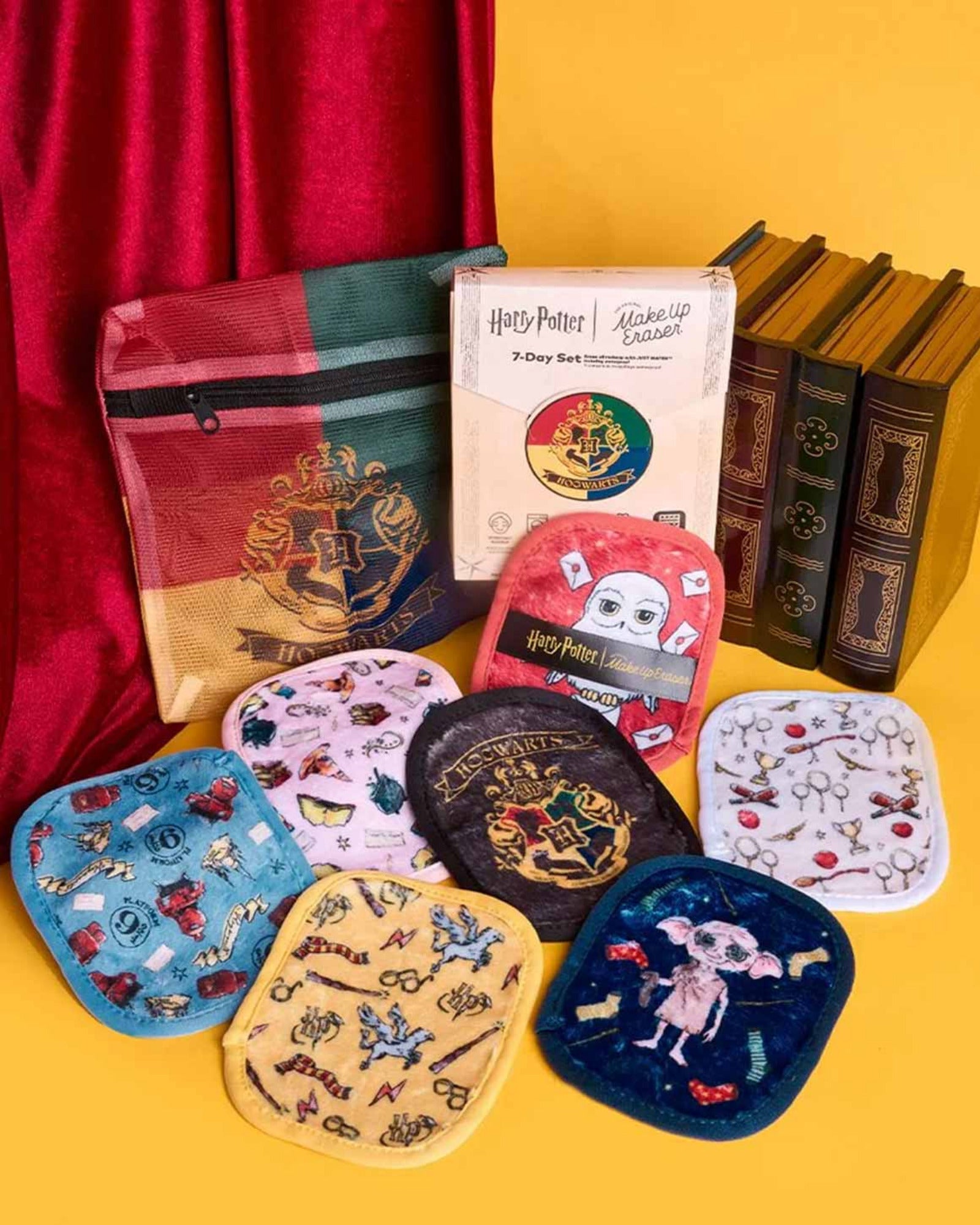 Collection of Harry Potter-themed pouches and books on a yellow background