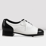 Black and white tap dance shoe on a light gray background