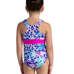 Girl wearing a colorful leotard with a leopard print pattern on a white background