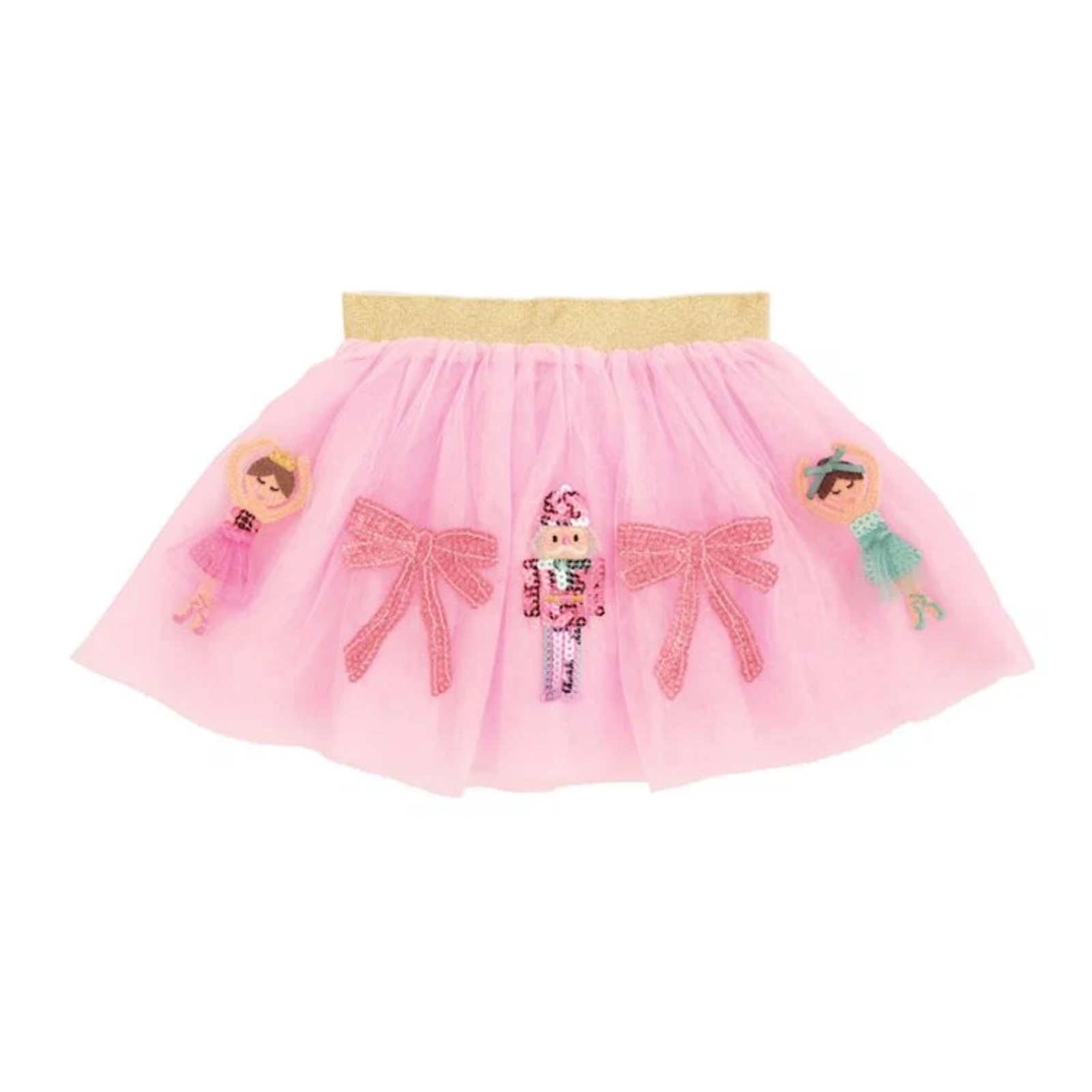 A pink tulle tutu skirt with a gold glitter waistband, decorated with two pink bow appliqués, a nutcracker figure in the center, and two small ballerina character appliqués on the sides.