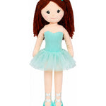 Doll with teal dress and shoes on a white background