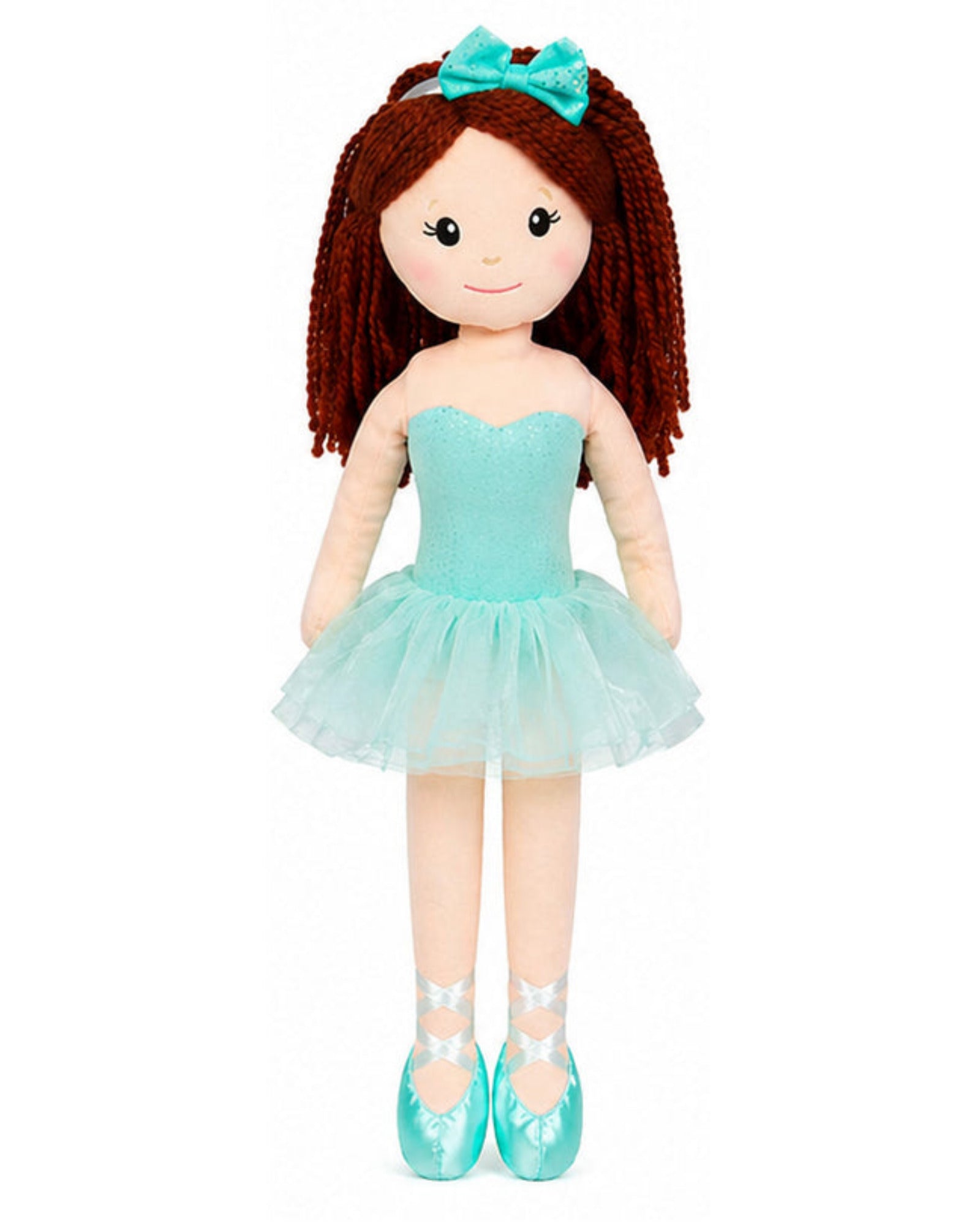 Doll with teal dress and shoes on a white background
