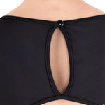 Black sports bra with a unique design on a white background