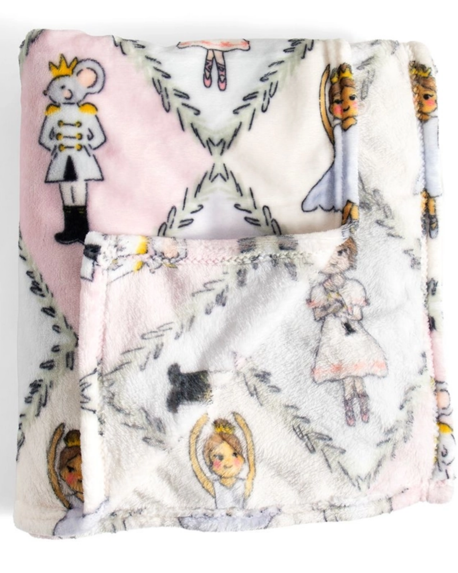 A folded plush blanket with a soft pink and white background, featuring a whimsical print of Sugar Plum Fairies, a mouse in a royal outfit, and delicate gray floral vine motifs.
