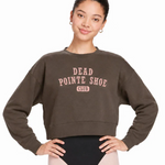 A woman modeling a dark brown cropped sweatshirt with 'DEAD POINTE SHOE CLUB' printed in pink on the front, paired with black and pink leggings, against a plain white background.