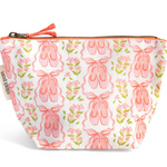A small zippered pouch with a white background and a repeating pattern of pink ballet shoes, pink flowers, and green leaves. The pouch has a peach zipper and a small fabric tag on the left side that reads 'PINK PAPER'.