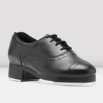 Black tap dance shoe on a white background