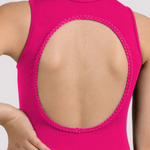 Close-up back view of a sleeveless bright pink garment with a large oval cutout bordered by braided trim, worn by a model against a light gray studio background.