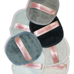 Set of reusable makeup erasers in various colors with 'Make Up Eraser' branding.