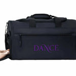 A black dance bag with the word 'DANCE' printed in purple on the front, shown on a white background with ballet slippers and a water bottle in its side pockets.