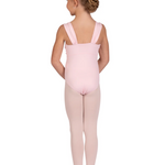 A young girl with her hair in a bun is shown from the back wearing a light pink tank dance leotard and matching pink tights against a solid white background.
