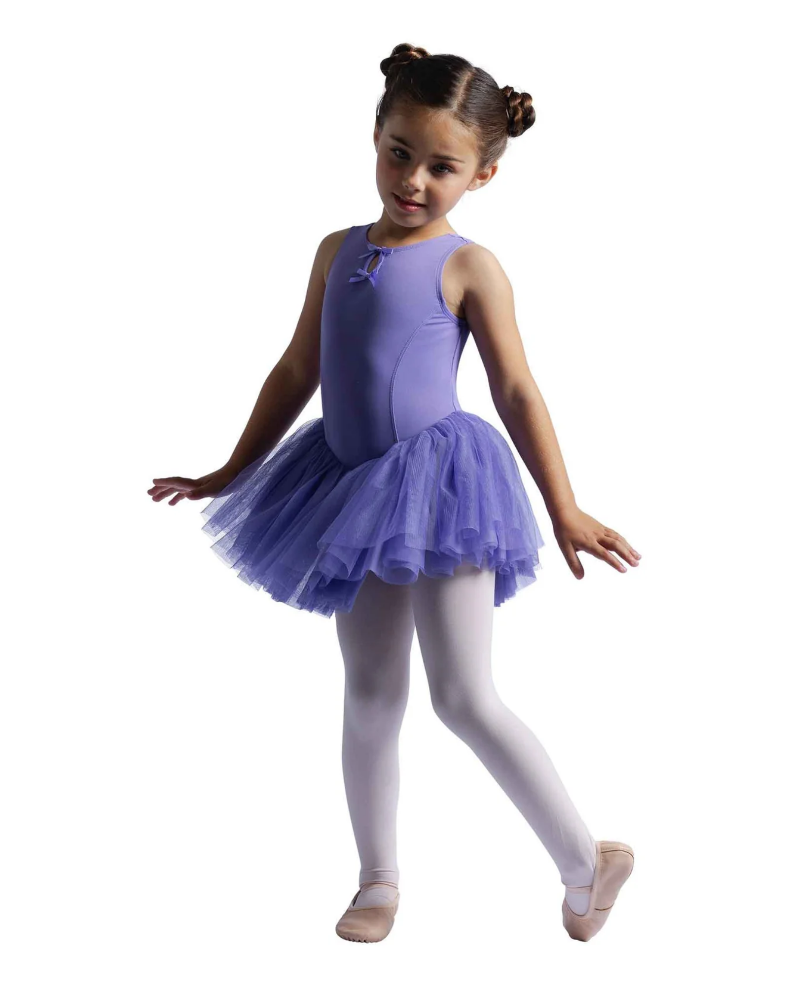 Young girl in a purple ballet dress posing on a white background