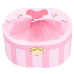 A pink round music box or storage box with a ballerina theme, featuring a pink tutu skirt design on the lid, pink and white vertical stripes on the body, and a small gold clasp.