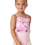A young girl modeling a pink tank leotard with a darker pink floral pattern across the chest and shoulders, paired with light pink tights, against a plain white background.
