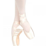 A pair of satin pointe shoes worn on a dancer's feet, paired with light pink tights against a solid white background.