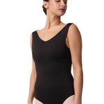 Woman wearing a black leotard on a white background