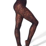 Black lace tights worn by a person on a white background
