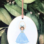 Decorative ornament with a fairy design on a leafy background