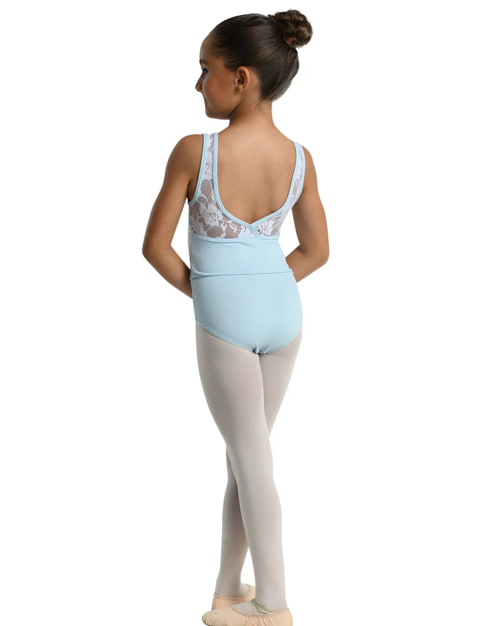 A young girl dancer shown from the back, wearing a light blue leotard with lace detailing, light pink tights, and pink ballet slippers, set against a plain white background.