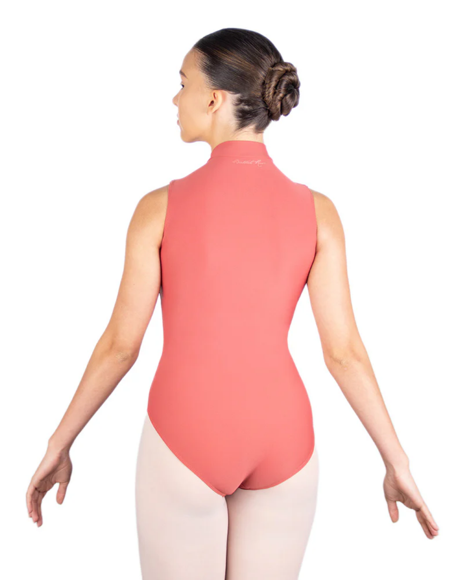 Person wearing a coral leotard and pink tights on a white background