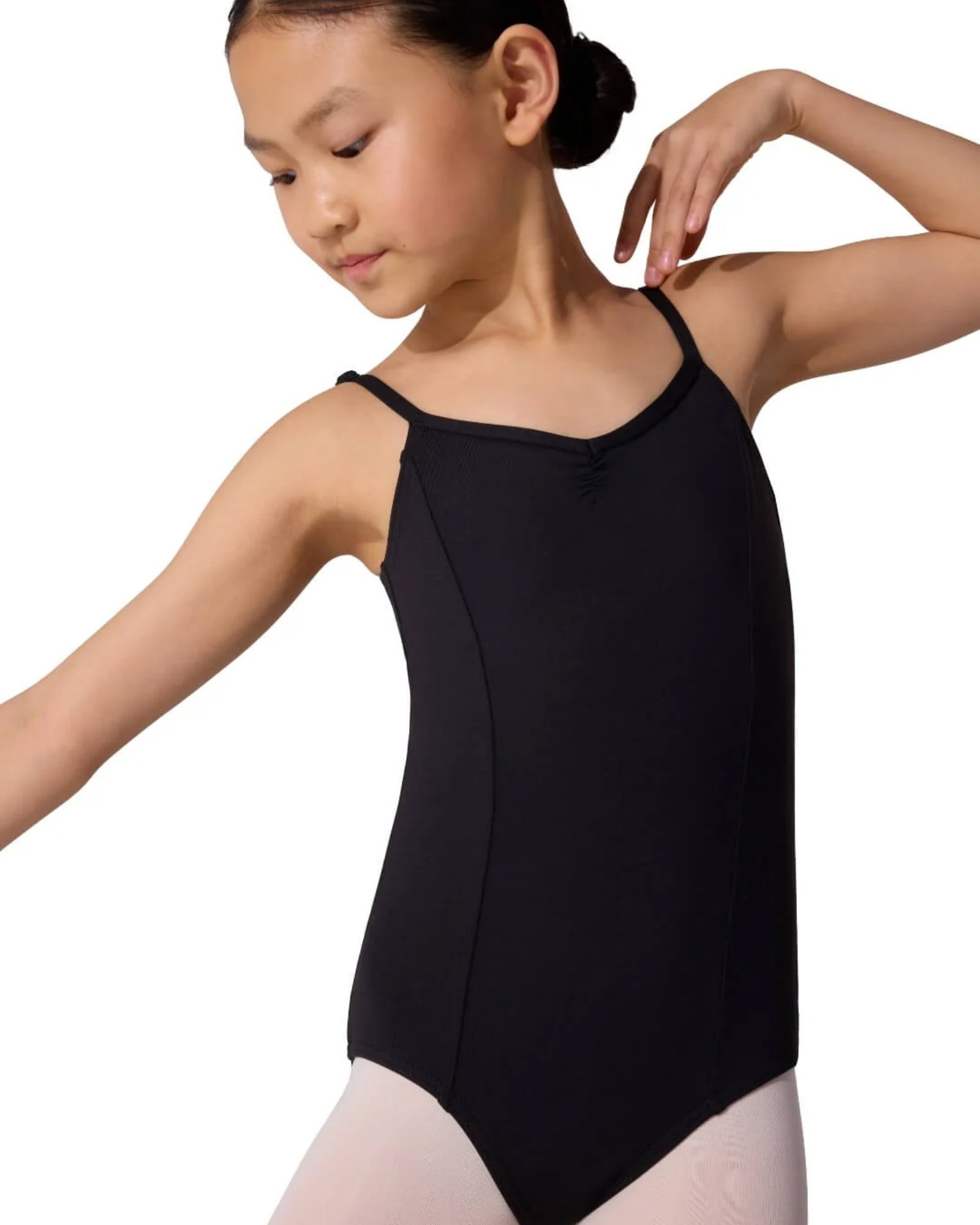 Young dancer wearing a black leotard on a white background