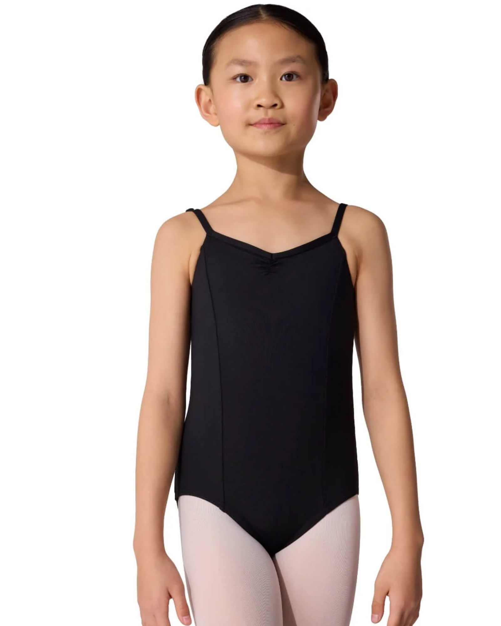 Young girl wearing a black leotard on a white background