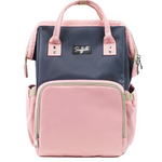 A pink and gray backpack with top handles, a front zippered pocket, and a small black brand patch reading 'Suffolk' on a white background.
