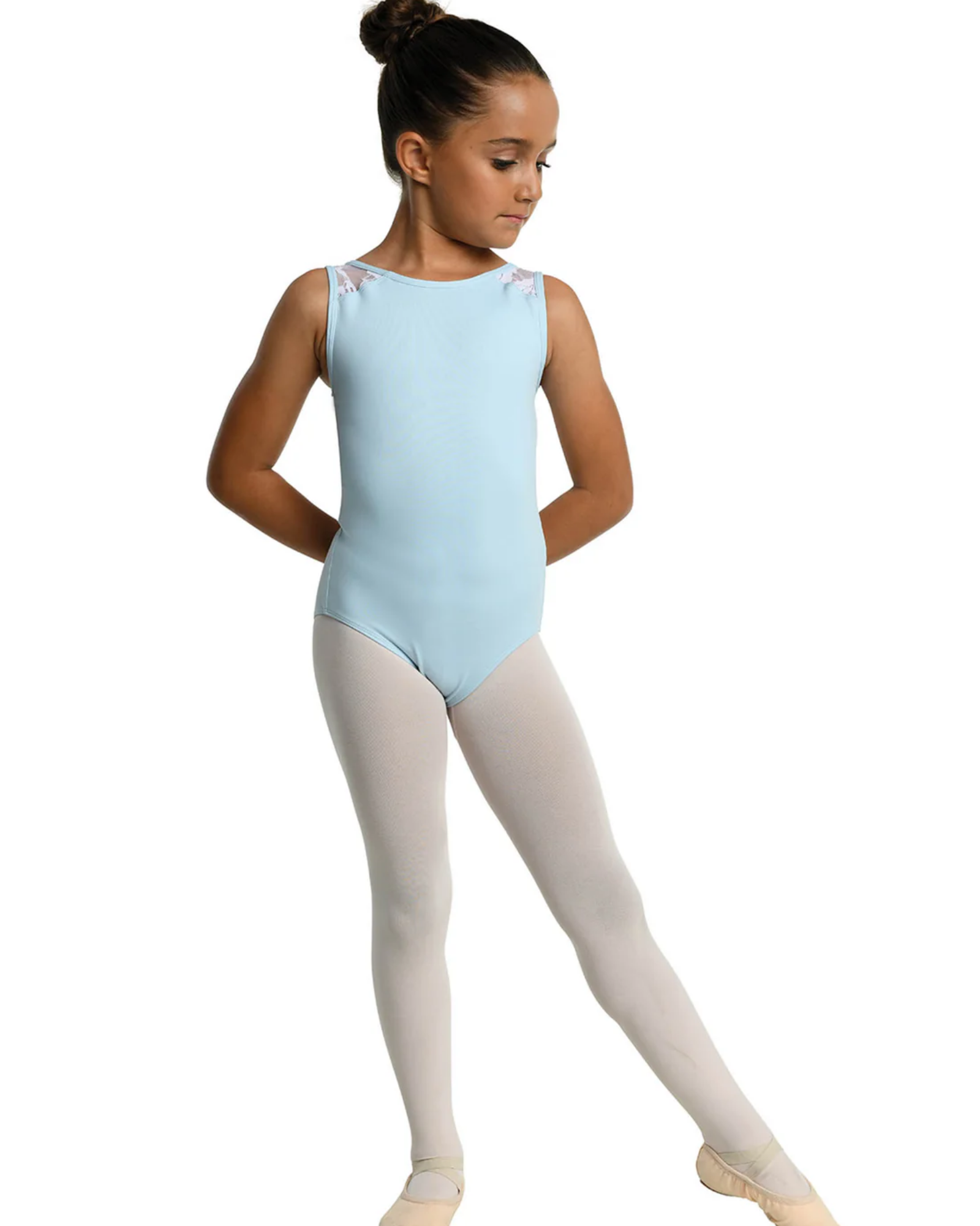 A young girl dancer wearing a light blue sleeveless leotard, pink tights, and ballet slippers, posed against a solid white background.