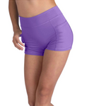 Purple athletic shorts worn by a person on a white background