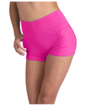Pink athletic shorts worn by a person on a white background