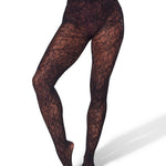 Black lace tights worn by a person on a white background